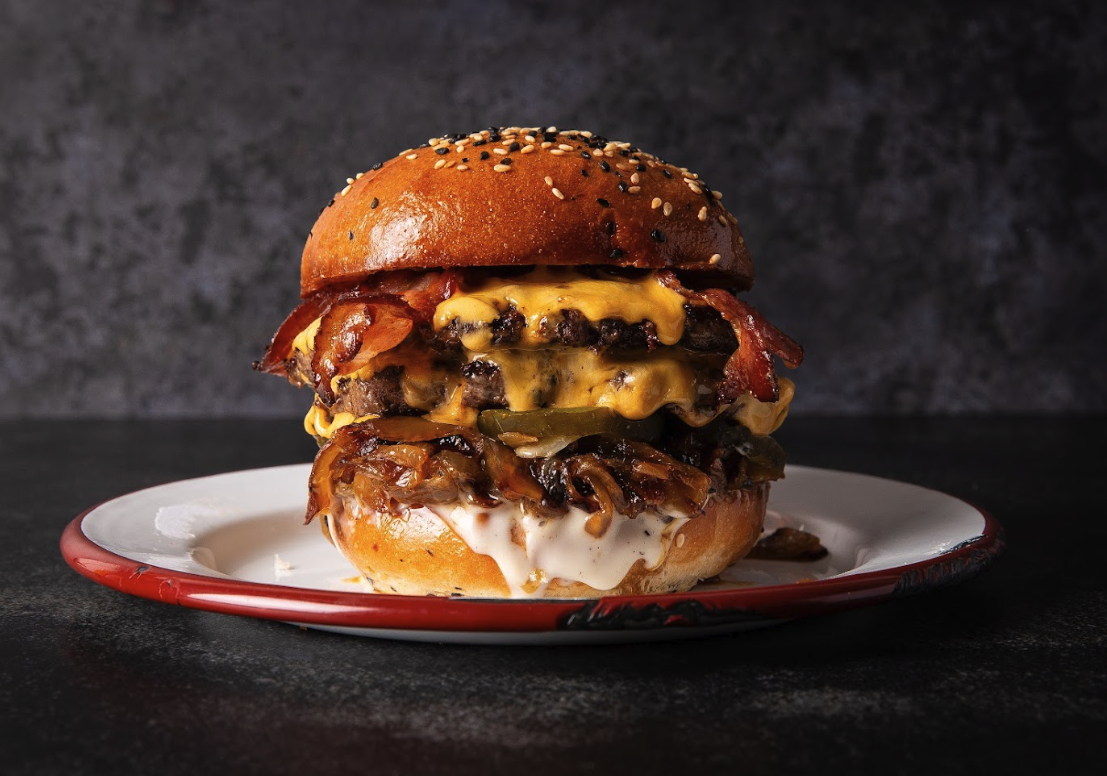 Close-up of a burger topped with caramelised onions